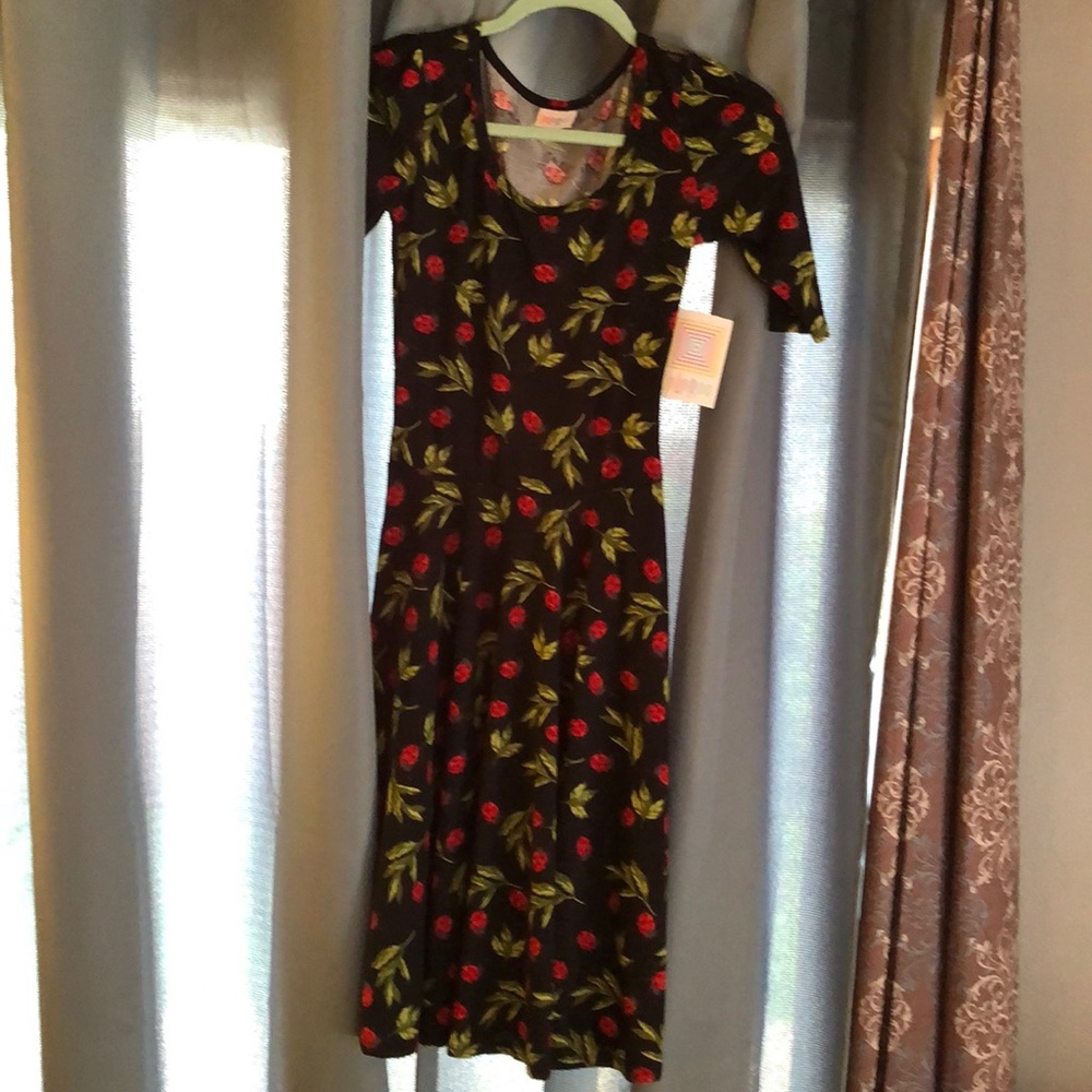 Black dress with leaves and ladybugs. Nicole style